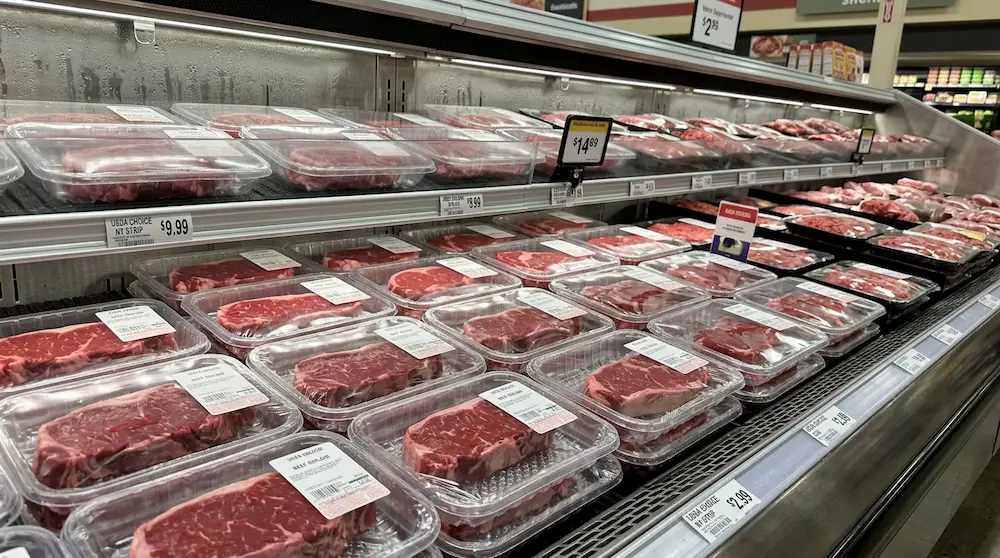 Clear PET meat trays for beef steaks in American supermarket refrigerated display