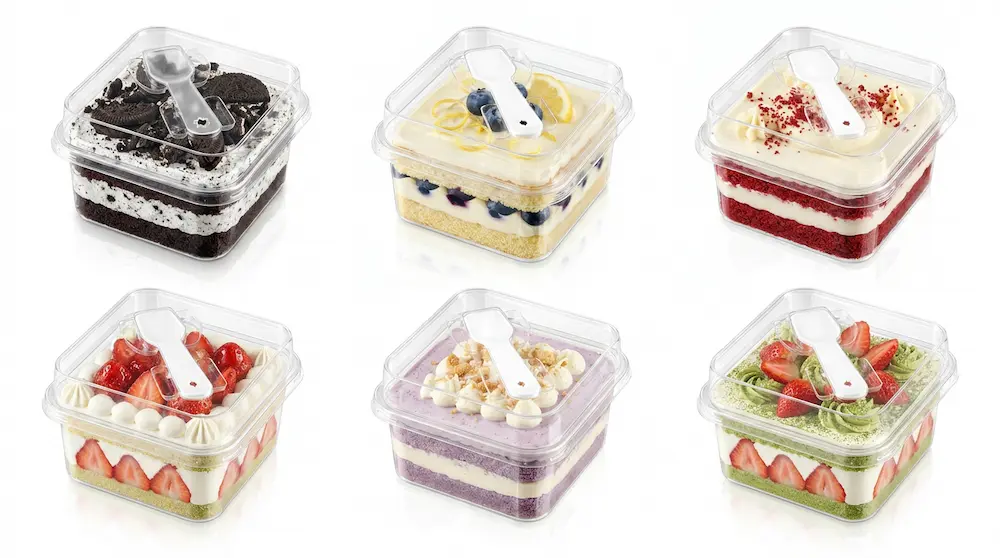 Six clear square PET dessert boxes with spoon lids for assorted cake packaging