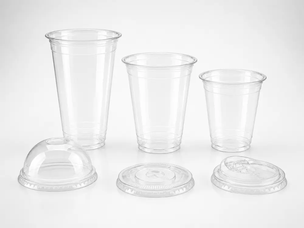 Coffee Cups with Lids FAQ: Materials, Sizes, Uses, and Ordering Questions 1 Clear PET coffee cups with flat lid, dome lid, and sip-through lid options for cold drinks.