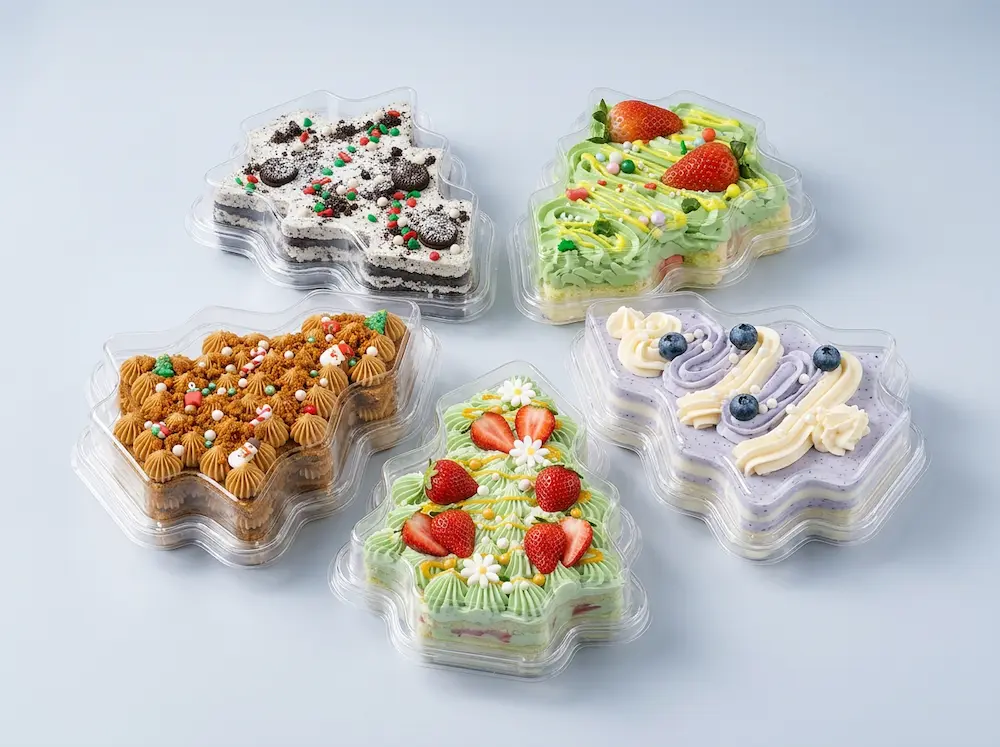 Clear Christmas tree shaped PET dessert containers for cakes, mousse, pastries, and holiday bakery packaging