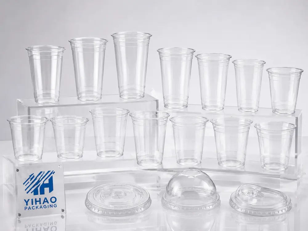 Juice, Lemonade, and Sparkling Fruit Drink Cups Complete Guide 3 Clear PET cold cup size range with flat dome and sip-through lids for beverage packaging