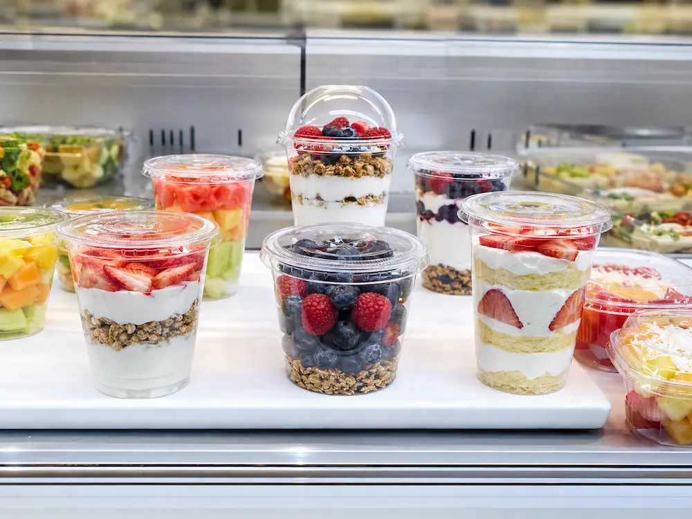 Clear PET cups and lids for yogurt parfaits, berry cups, fruit cups, and chilled grab-and-go food display