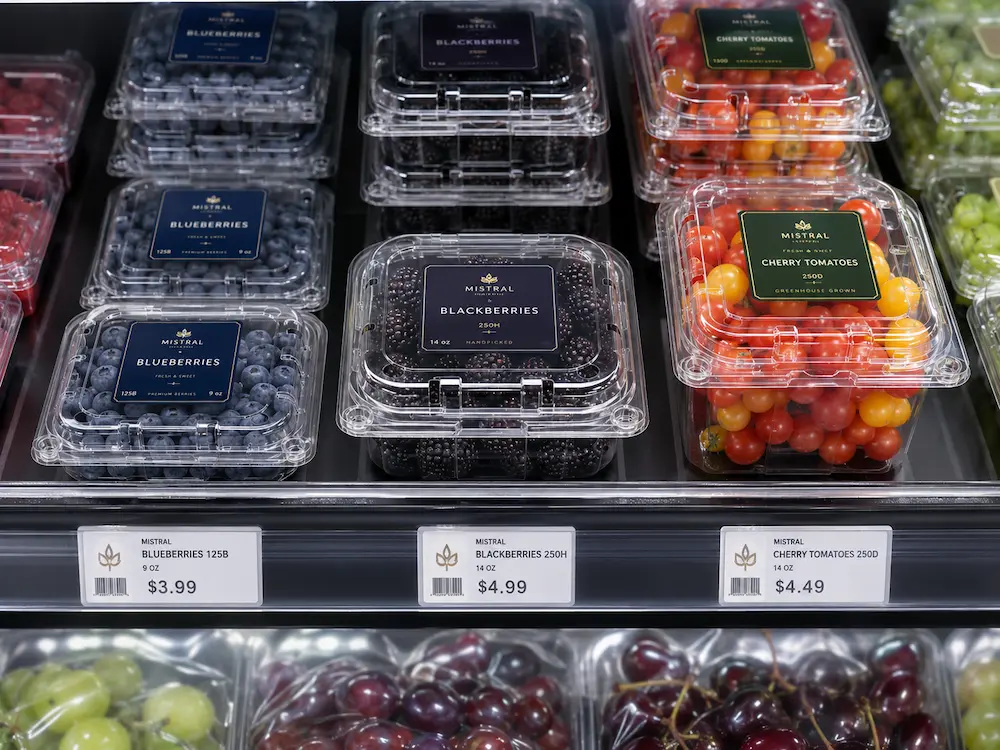 Shelf Life Packaging: Buyer Guide for Food Packaging Teams 3 Clear PET fruit clamshell containers for blueberries blackberries and cherry tomatoes in retail display
