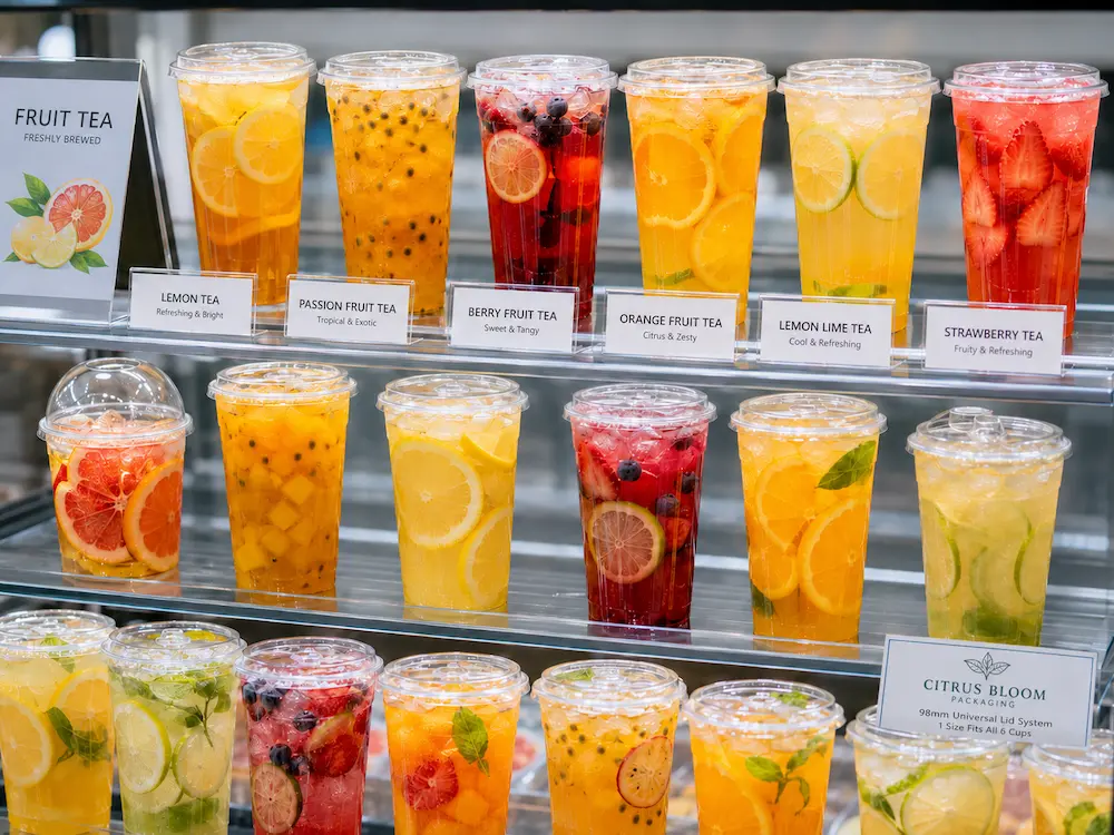 Wholesale Fruit Tea Cups: Manufacturer and Supplier Checklist 3 Fruit tea cups for juice, lemonade, berry fruit tea, orange tea, and strawberry tea display