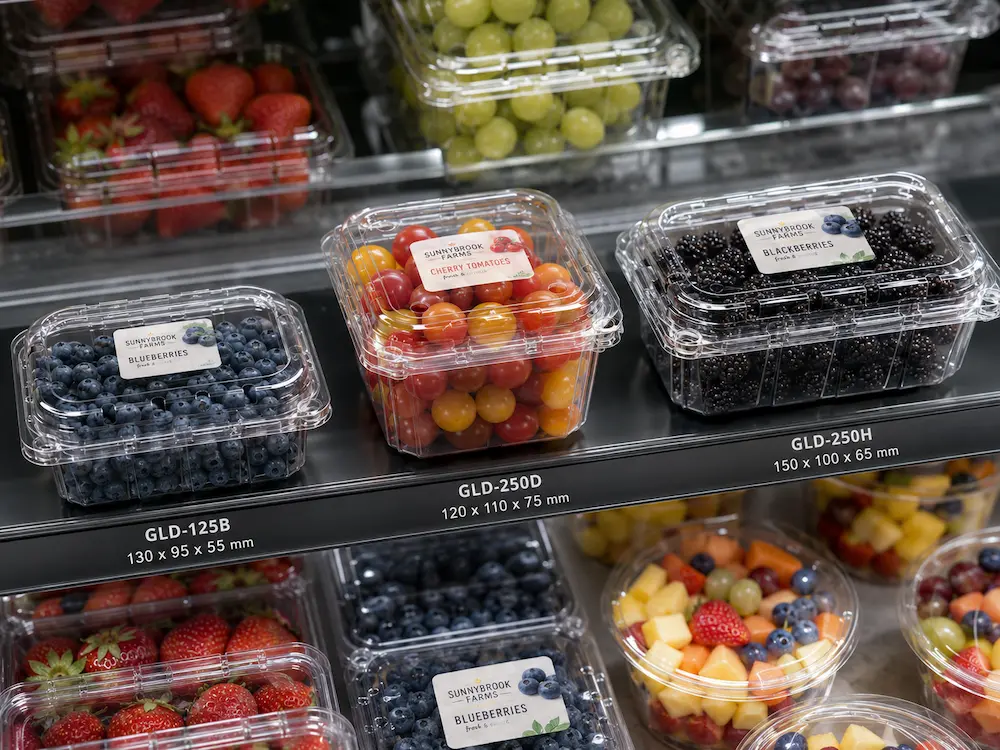 Best Breathable Produce Packaging for Retail Display, Takeaway, and Chilled Food 4 Labeled vented produce clamshells for blueberries cherry tomatoes and blackberries in chilled retail display