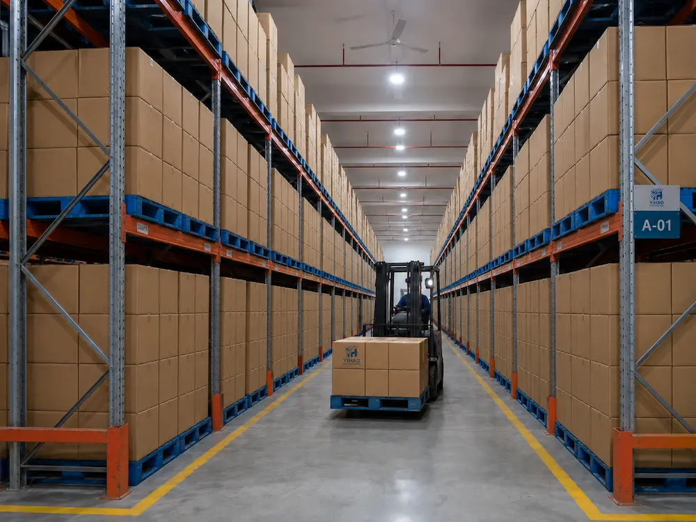 Warehouse logistics for wholesale berry packaging with palletized cartons and forklift handling